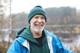 expressive-senior-man-posing-outdoor